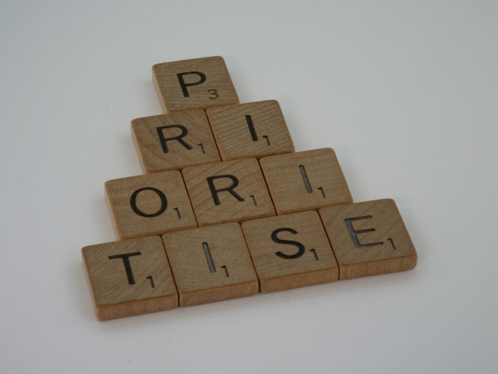 Wooden letter blocks spelling "Prize," symbolizing choosing the right AI tool, as some users may prefer another AI assistant based on their specific needs and priorities.