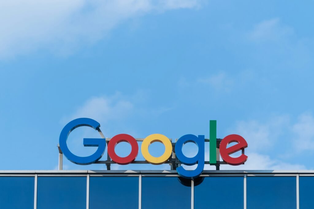 Google logo displayed on a modern building, representing the company behind Google Gemini and its growing ecosystem of AI-powered products and services.