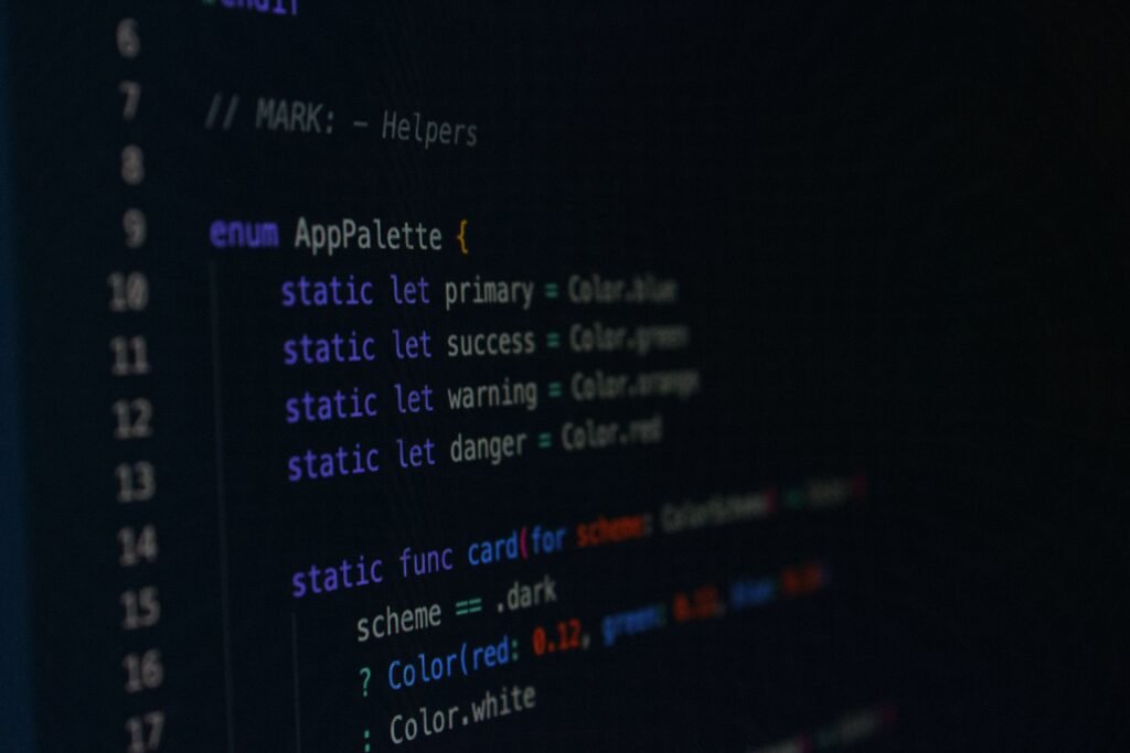 Close-up of colorful code displayed on a computer screen, representing software development, artificial intelligence, programming, and modern technology.