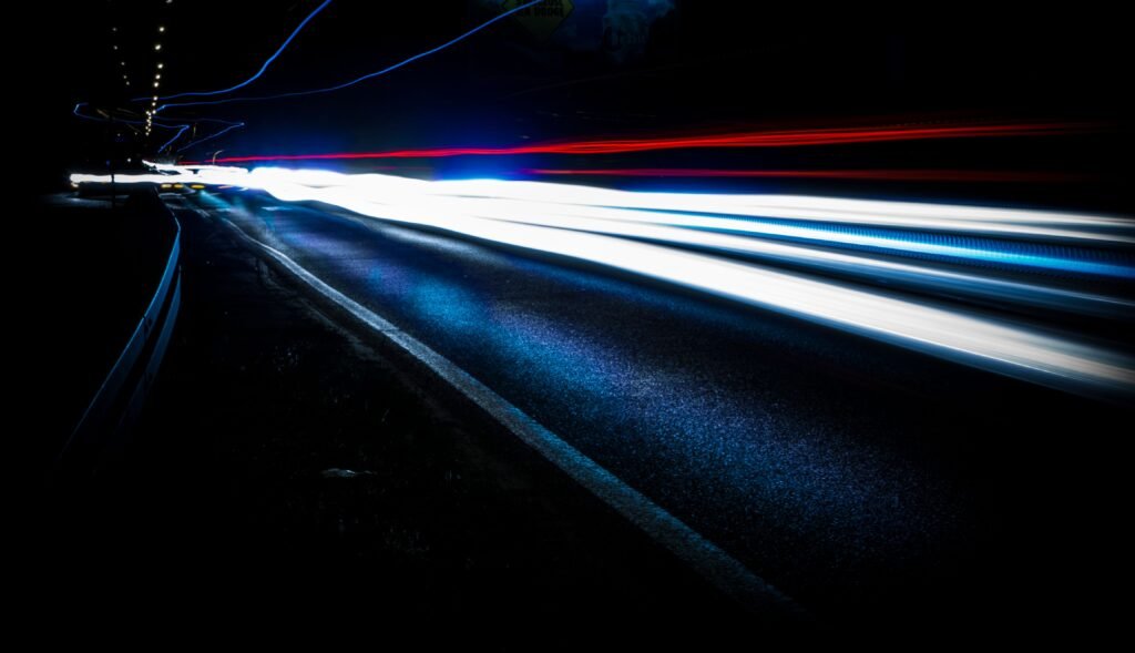 Abstract streaks of light representing high-speed AI processing, rapid data transfer, and fast performance in modern artificial intelligence systems.