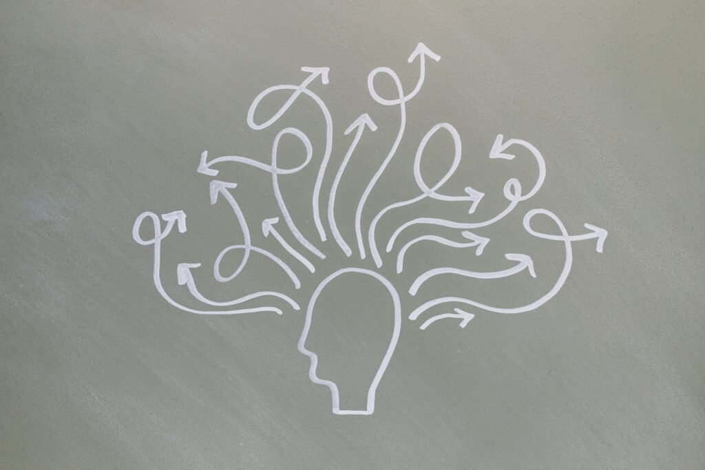 Conceptual artwork of a glowing human head with interconnected neural pathways, symbolizing artificial intelligence, machine learning, and advanced digital thinking.