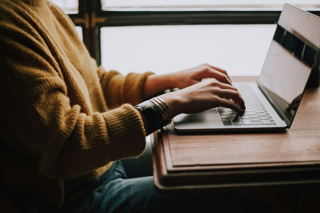 Person learning the truth about AI myths and facts on a laptop