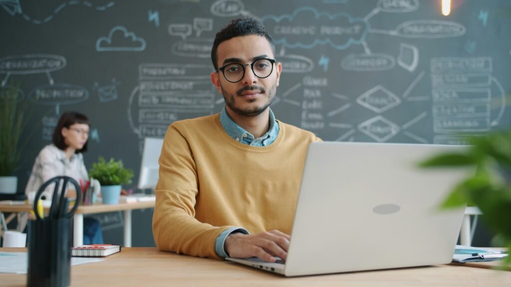 Employee using AI software to improve workplace productivity
